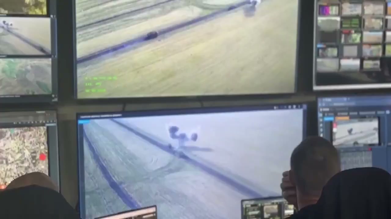 Drone footage during the assault (video still)